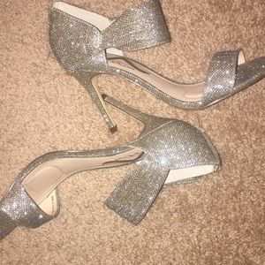 NINA Gold heels with zipper on the back.